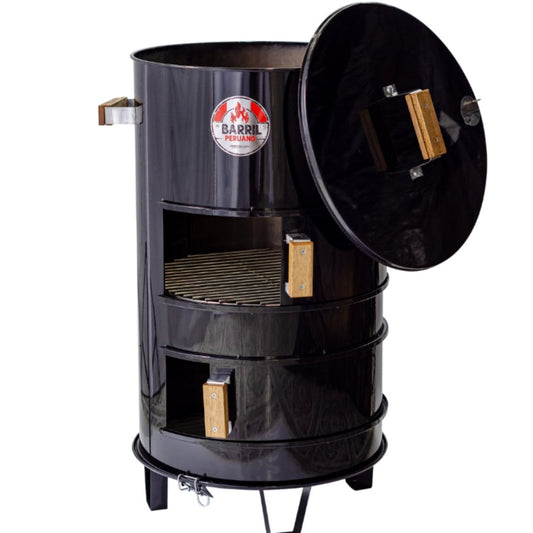 Barril de hierro resistente ideal para asar, hornear y ahumar carnes. Tamaño perfecto para uso familiar o eventos medianos. Cocina con brasa, humo y tradición.